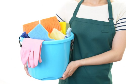 Technician preparing carpet cleaning equipment with safety focus